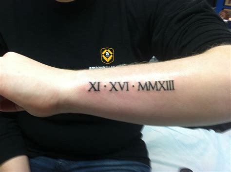 2009 tattoo|2009 roman numeral tattoo